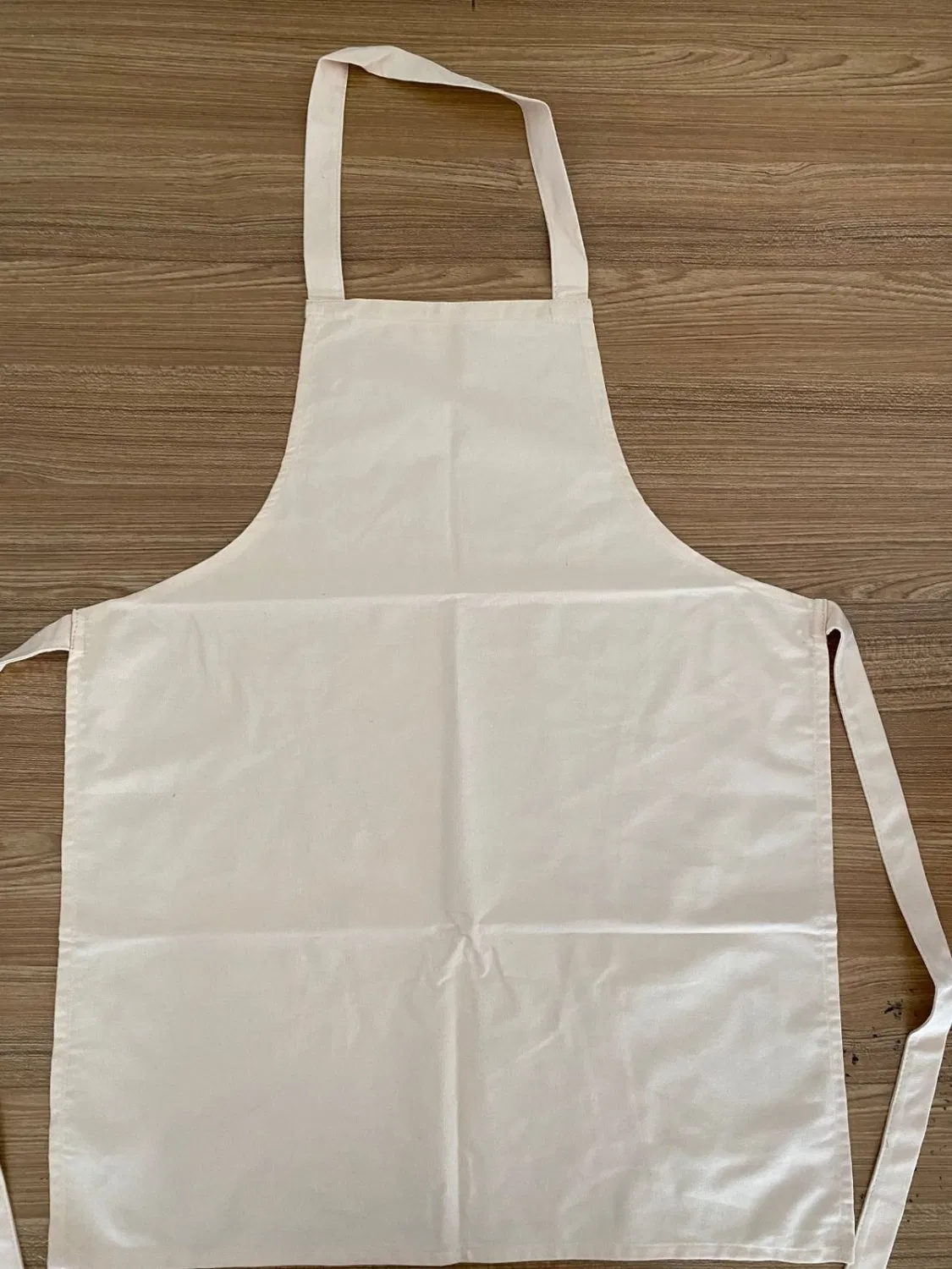 Tablier de cuisine promotionnel personnalisé de couleur pure, bavoir utilisé pour la cuisine, la pâtisserie et le nettoyage